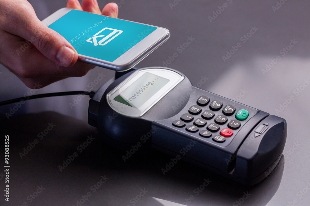 Composite image of mobile screen showing payment successful Composite image of mobile screen showing payment successful