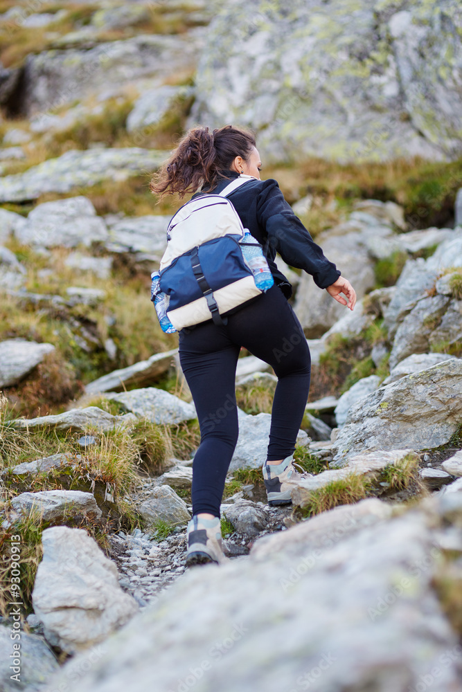 Woman hiker on a trail