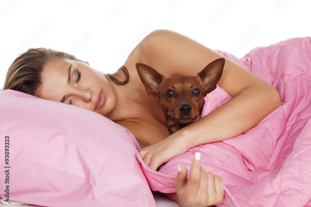 young beautiful woman sleeping in bed with her dog young beautiful woman sleeping in bed with her dog