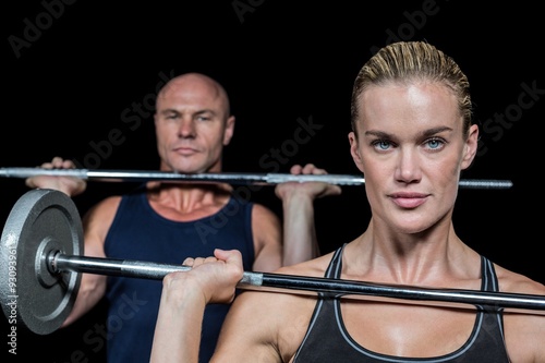 Portrait of woman and man lifting crossfit © WavebreakMediaMicro