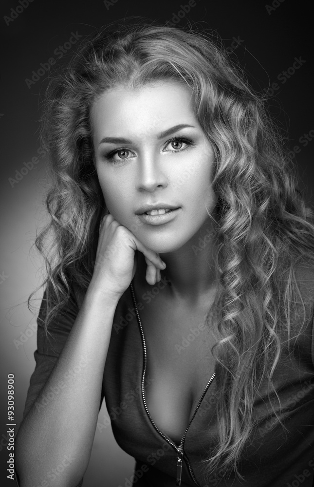 Simple black and white portrait of a beautiful young blonde with