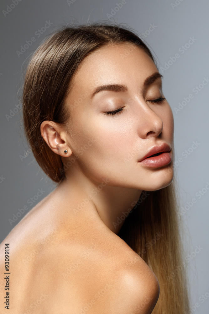 Beauty woman face. Girl with clear skin and long hair