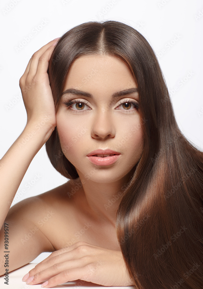Beautiful woman with long brown straight hairs - isolated on whi Beautiful woman with long brown straight hairs - isolated on whi