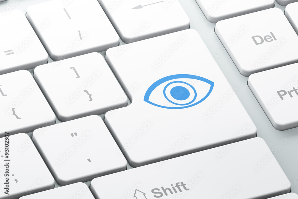 Security concept: Eye on computer keyboard background Security concept: Eye on computer keyboard background
