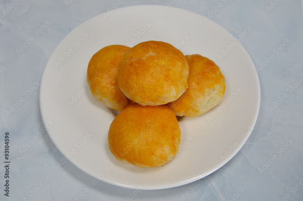 Chinese cake filling sweet bean and salted egg on dish Chinese cake filling sweet bean and salted egg on dish