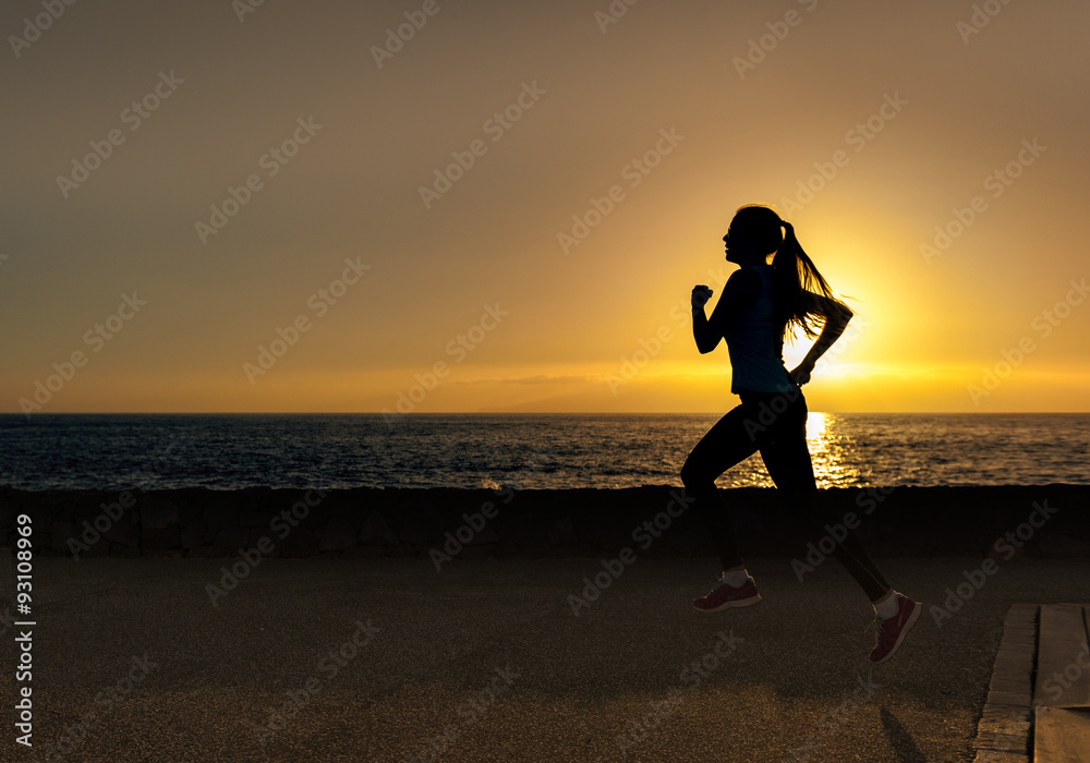 Young woman run near the sea
