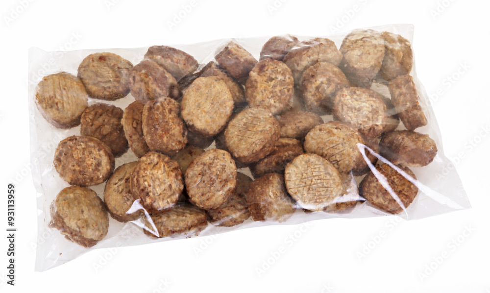 Pack with ready-to-cook meat nuggets isolated on white backgroun Pack with ready-to-cook meat nuggets isolated on white backgroun