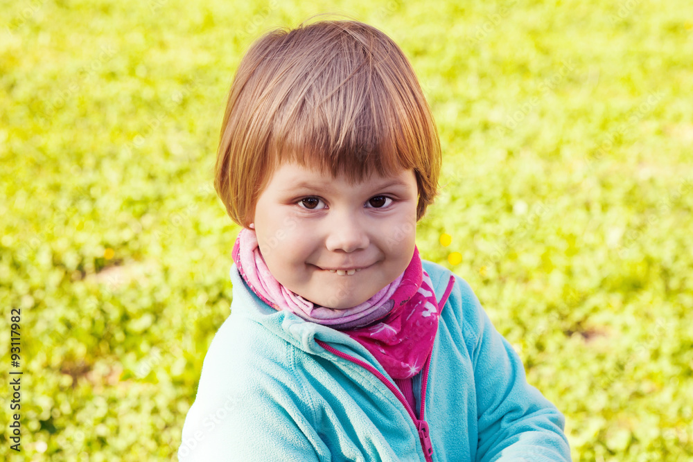 Outdoor portrait of smiling Caucasian baby girl Outdoor portrait of smiling Caucasian baby girl
