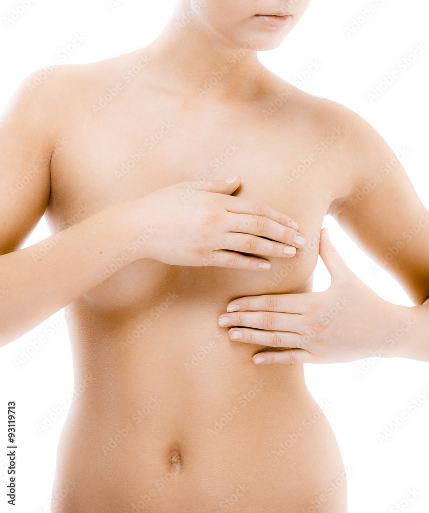 Woman examining her breast isolated on white background Woman examining her breast isolated on white background