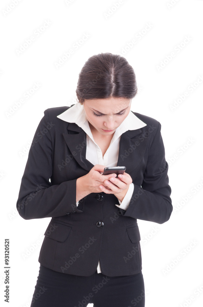Concentrated young business woman reading and chatting on smartp Concentrated young business woman reading and chatting on smartp