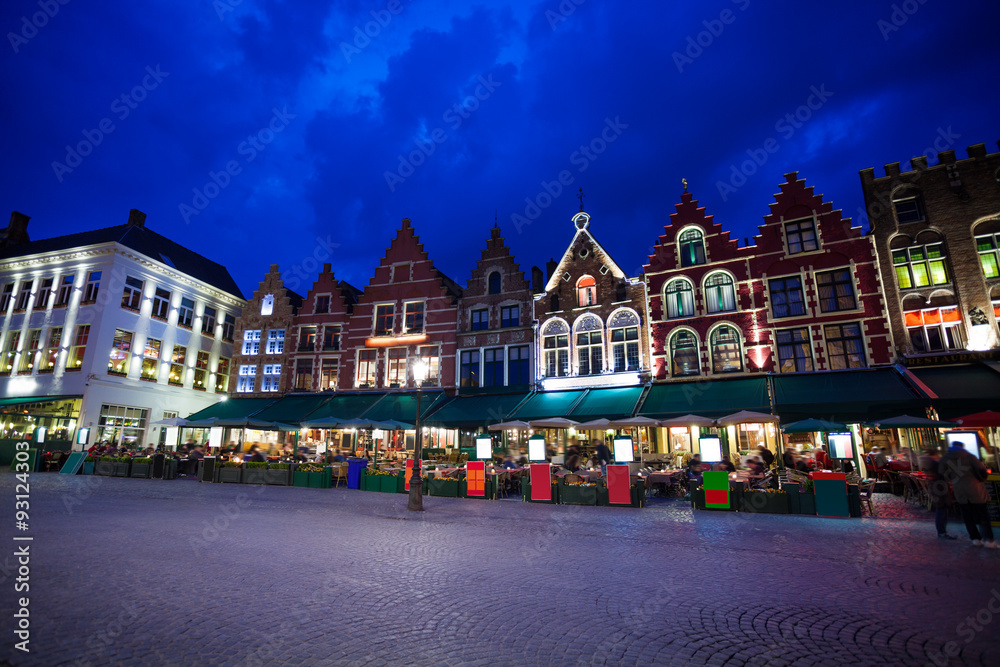 Naklejka premium Grote Markt square with market at night in Bruges