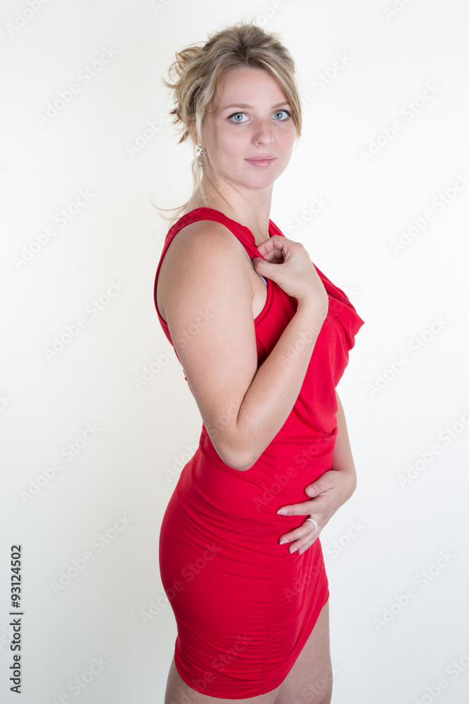 Blond and gorgeous girl posing for camer, isolated