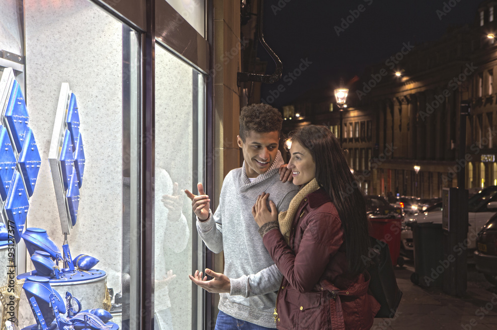 Young couple looking at jewellery Young couple looking at jewellery