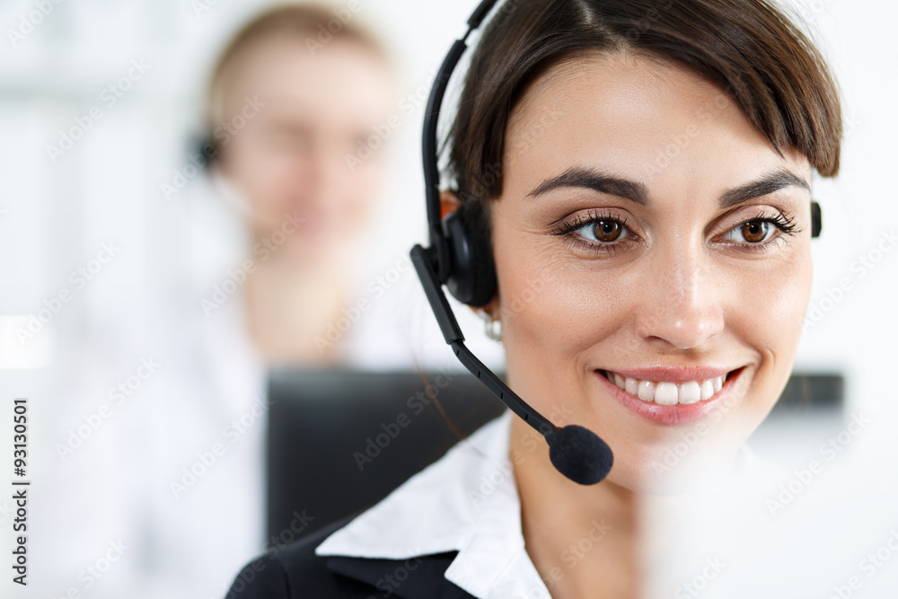 Female call center service operator at work Female call center service operator at work