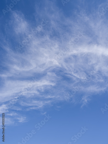 Cirrus clouds in the blue sky.