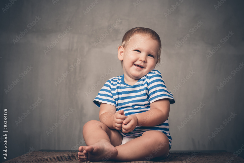 beautiful baby boy laughing
