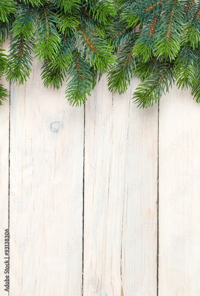 Christmas wooden background with fir tree Christmas wooden background with fir tree