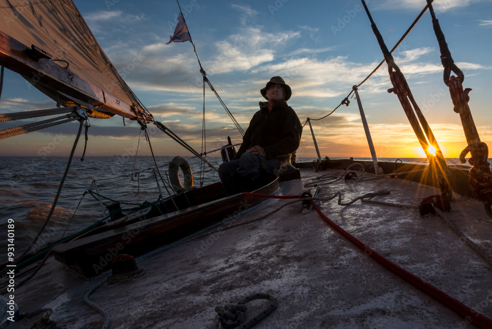 Naklejka premium Captain Sailing Rio de la Plata River. Buenos Argentina.