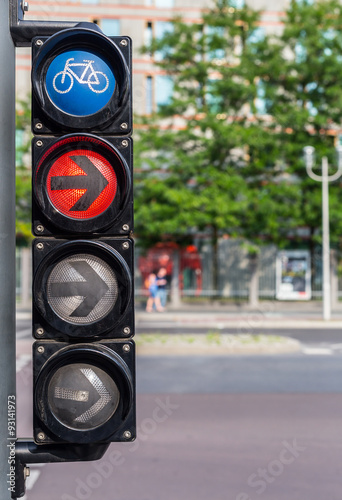Bicycle traffic lights with red light and arrow