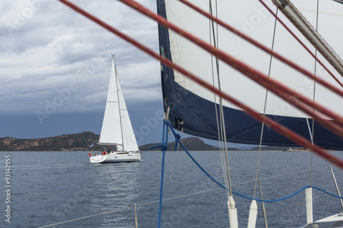 Sailing. Sailboats in sailing regatta on Aegean Sea. Ship yachts with white sails in the open Sea. Luxury boats.