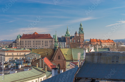 Royal castle and cathedral on the Wawel hill seen from the Town Hall tower in Krakow, Poland.