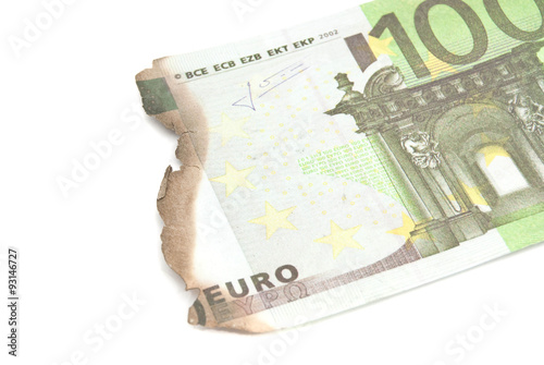 Obraz na płótnie burnt bills of hundred euro on white w salonie