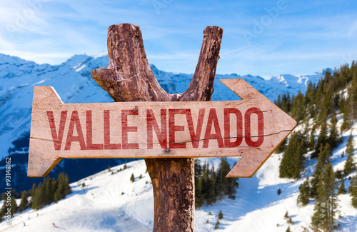 Valle Nevado wooden sign with winter background
