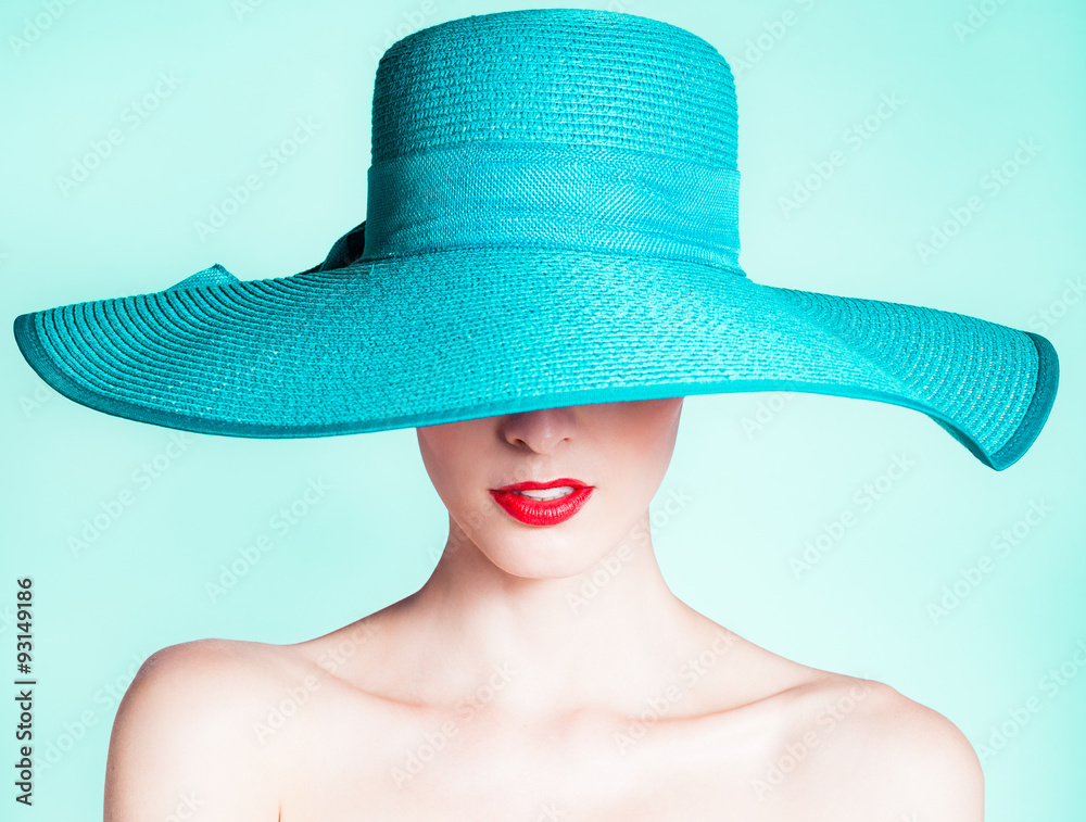Woman wearing hat. Fashion studio portrait - obrazy, fototapety, plakaty 