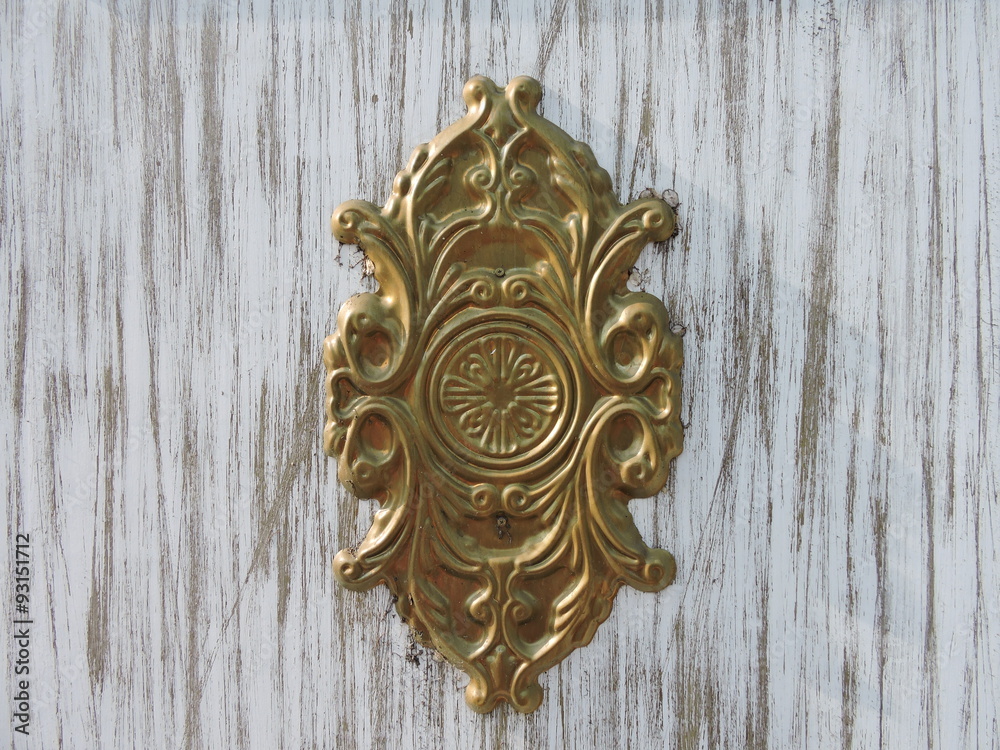 Golden Ornament on Wooden Background Golden Ornament on Wooden Background