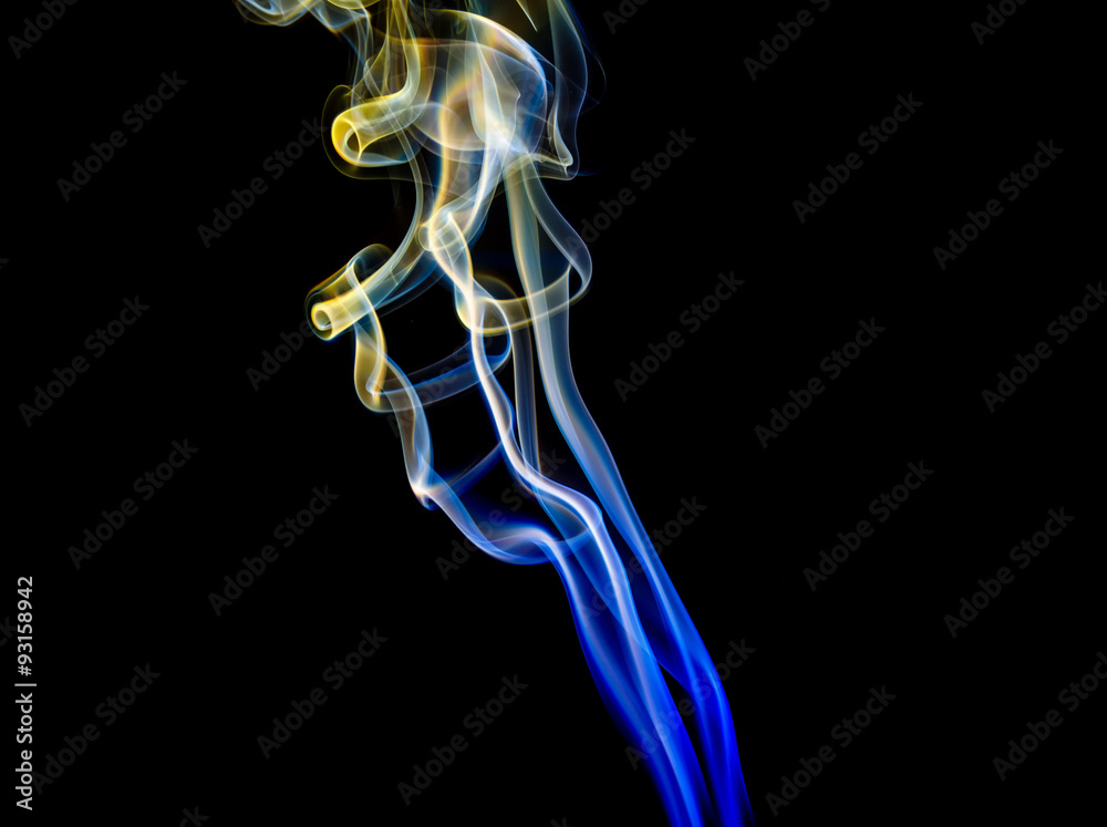 Abstract yellow-blue smoke from aromatic sticks. Abstract yellow-blue smoke from aromatic sticks.