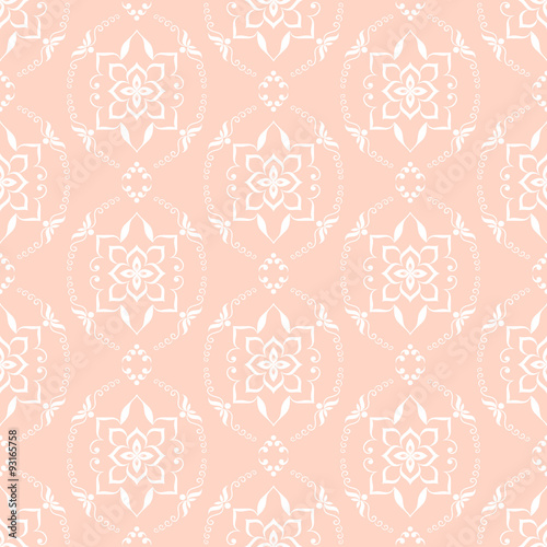 Seamless white texture on peach.