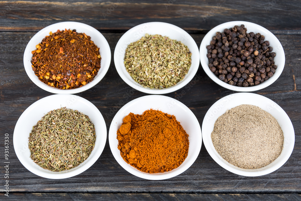 Spices and herbs in bowls. Spices and herbs in bowls.