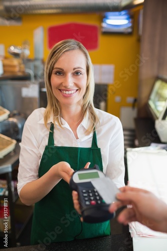 Female worker accepting payment