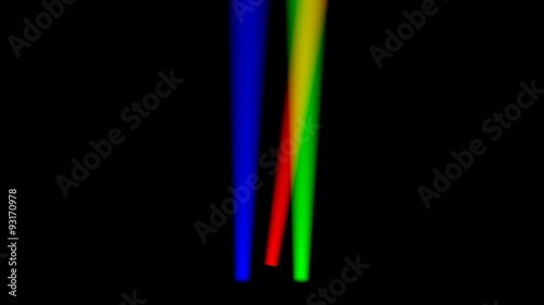 Three colorful spotlights shining upwards