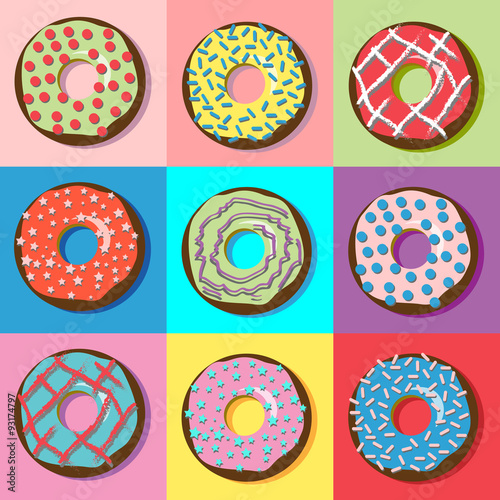 Donuts with various filling and sprinkles.