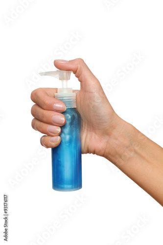 Female Hand Holding Pump Bottle