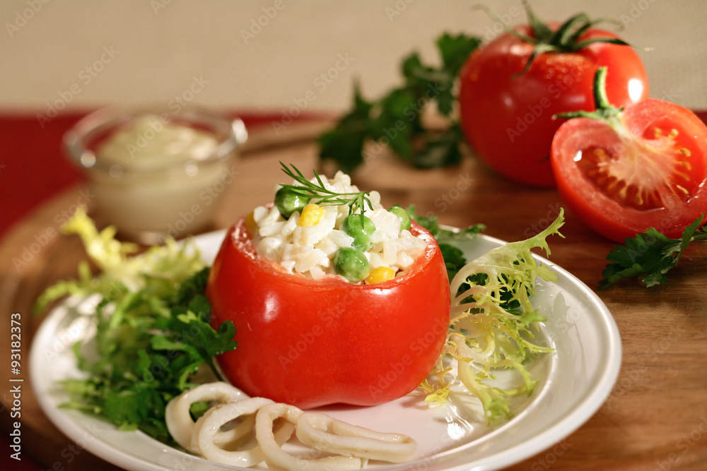stuffed tomato with squid, corn, peas and cream of tartar stuffed tomato with squid, corn, peas and cream of tartar