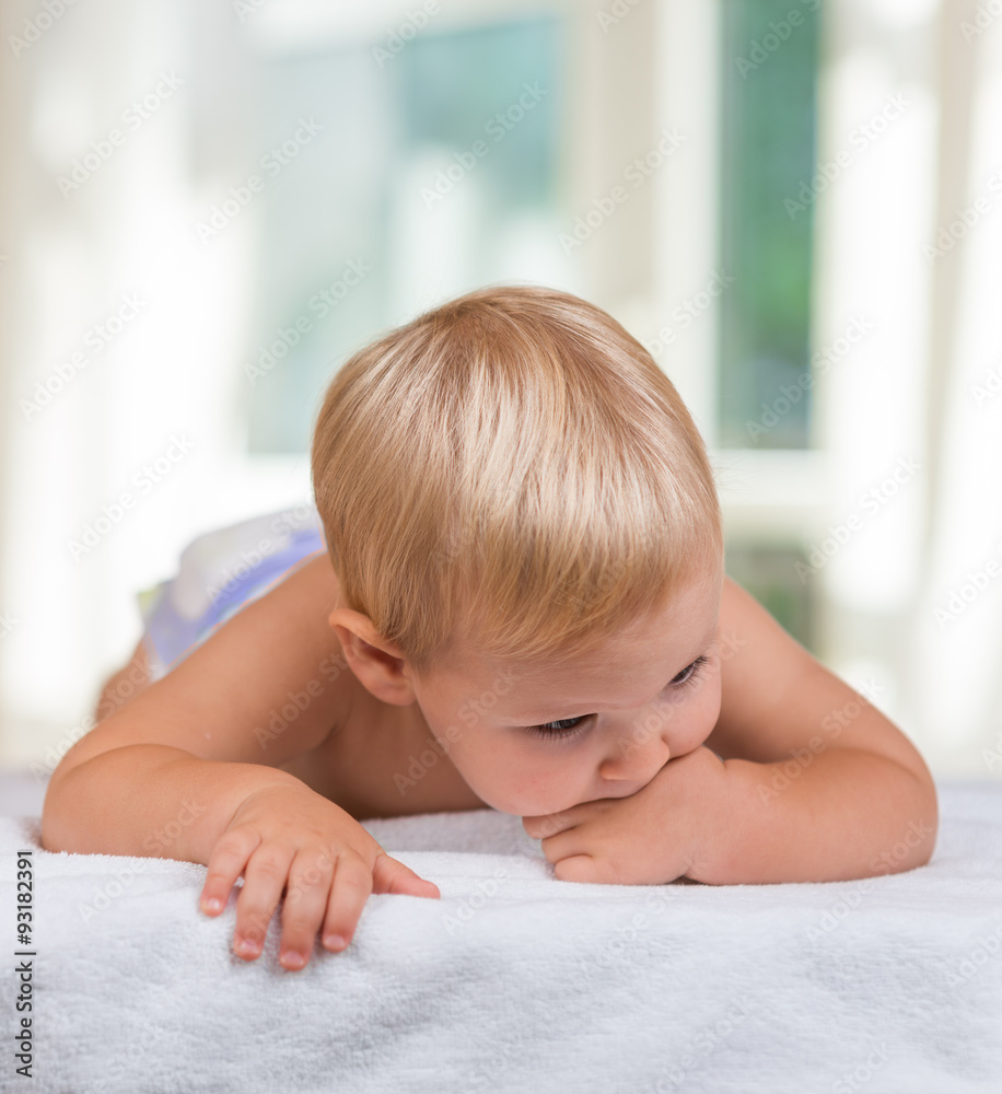 the very beautiful little baby , lie on stomach the very beautiful little baby , lie on stomach