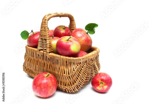 basket with red apples on a white background