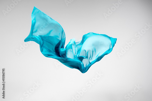 abstract teal fabric in motion