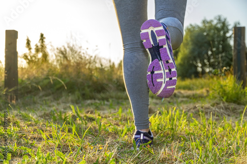 Woman running in a field