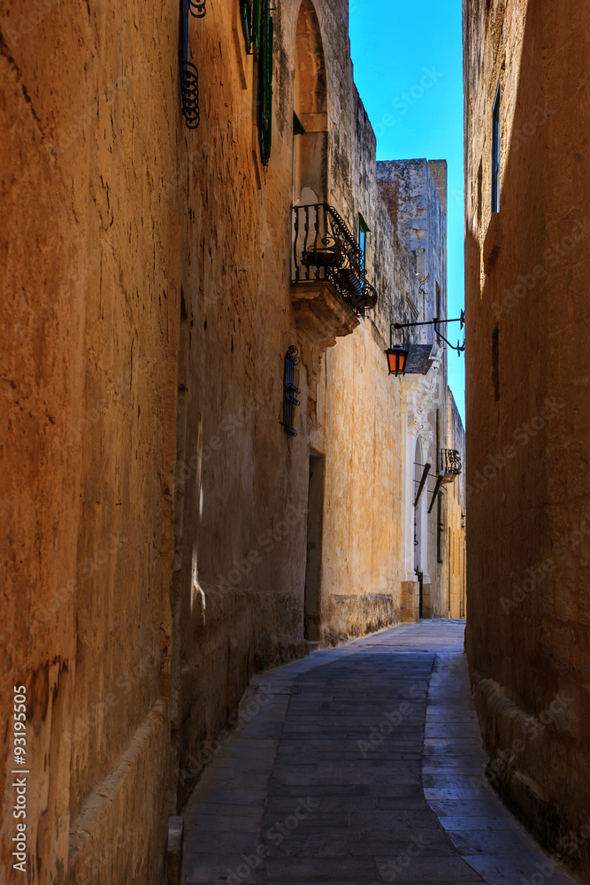 Antique narrow maltese street in Mdina
