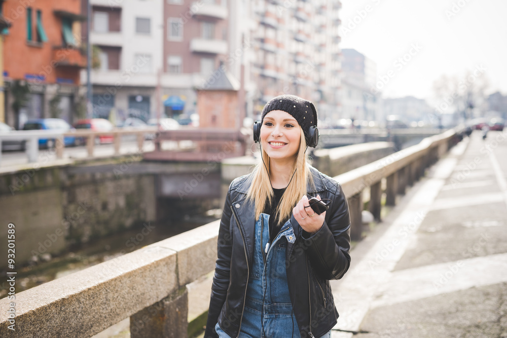Half length of young beautiful blonde straight hair woman in the Half length of young beautiful blonde straight hair woman in the
