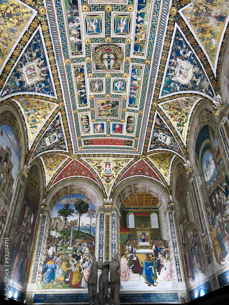 Obraz premium Piccolomini Library with frescoes inside Duomo di Siena or Siena Cathedral in Italy