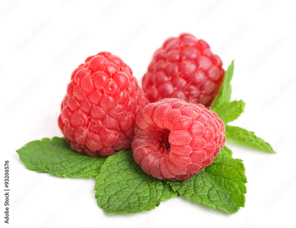 fresh ripe raspberries with mint leaves isolated on white fresh ripe raspberries with mint leaves isolated on white