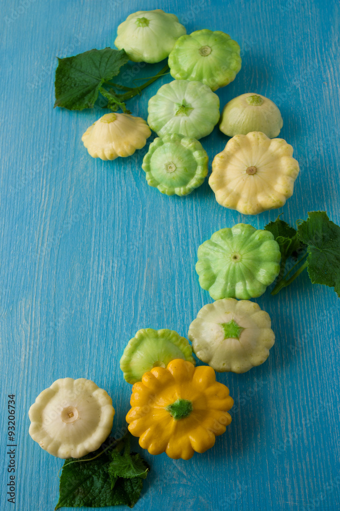 Fresh organic seasonal vegetables - pumpkin, squash, on wooden b
