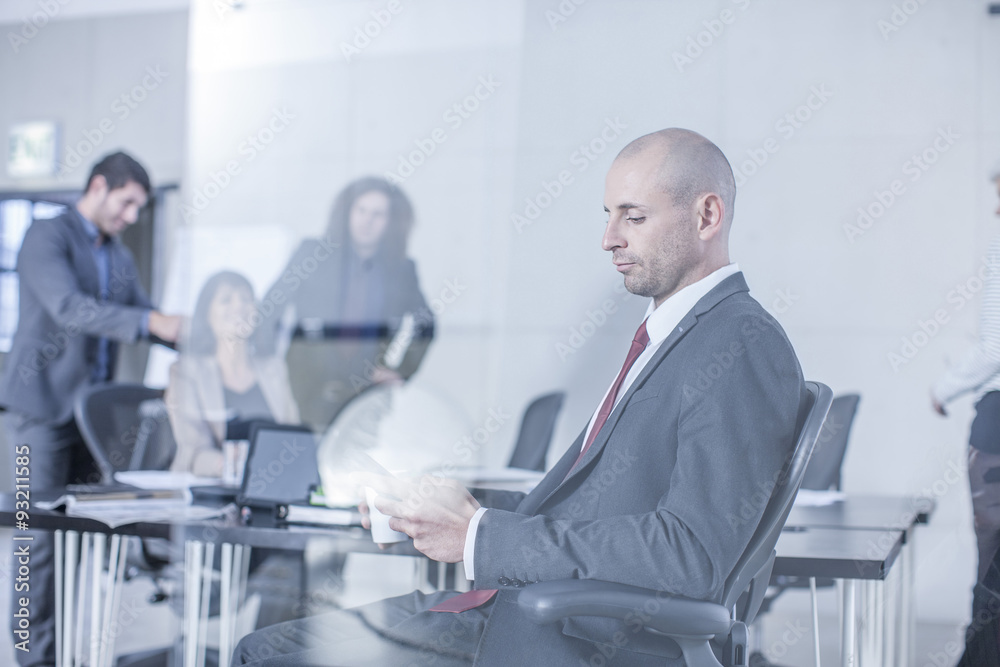Business people having a meeting in board room Business people having a meeting in board room