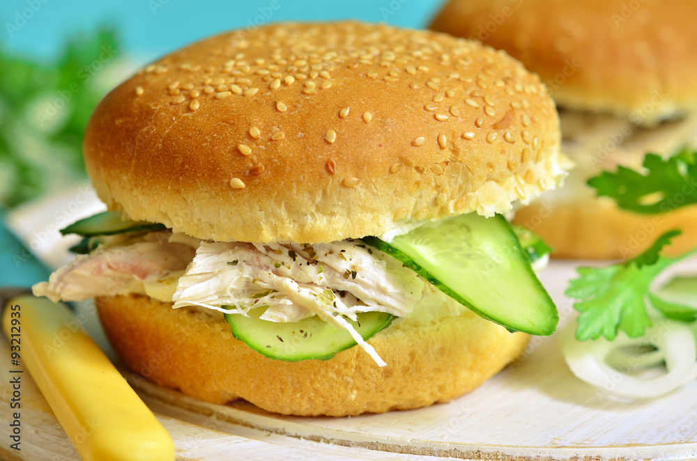 Healthy burger with cream cheese,boiled chicken and cucumber sli Healthy burger with cream cheese,boiled chicken and cucumber sli