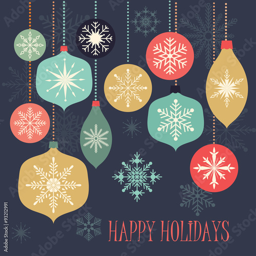 Christmas greeting card with Christmas balls and snowflakes