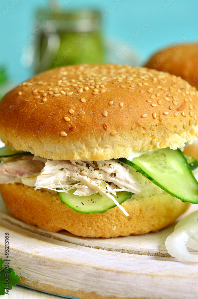 Healthy burger with cream cheese,boiled chicken and cucumber sli Healthy burger with cream cheese,boiled chicken and cucumber sli